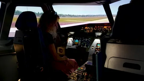 Airbus A320 flight simulator pilot training - instructor in cockpit Stock Footage 312672550
