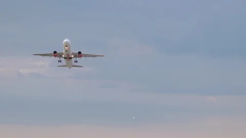 Airbus A320 of Servus flying overhead Stock Footage 118528939