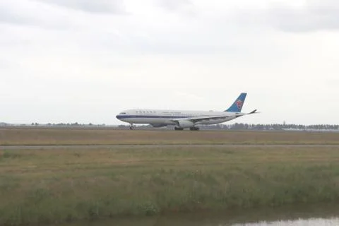 Airbus A330 signcode B-1063 of China Southern Airlines is taking of the Polde Stock Photos