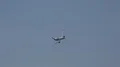 Airbus A350 XWB airplane fly over in sunny blue sky 4k or 4k+ Resolution