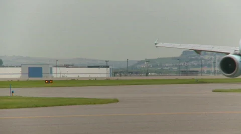 Aircraft, Airbus A319 taxi turn through frame Stock Footage