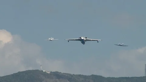 Aircraft Be-200ES performs  flight accompanied by two Be-103 . Video stock 120804272
