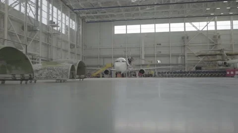 Aircraft being repaired in the hangar Stock Footage 164473012