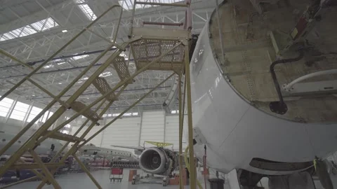 Aircraft being repaired in the hangar Stock Footage 165247747