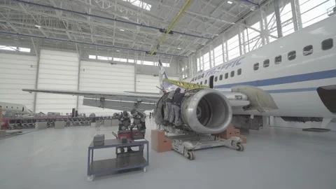 Aircraft being repaired in the hangar Stock Footage 165247809