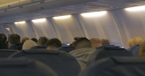 Aircraft cabin full of passengers Stock-Footage 74109399