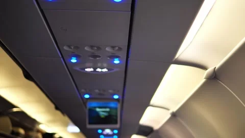 Aircraft cabin view displaying seating rows, overhead bins and windows aircraft Vidéo 280305646