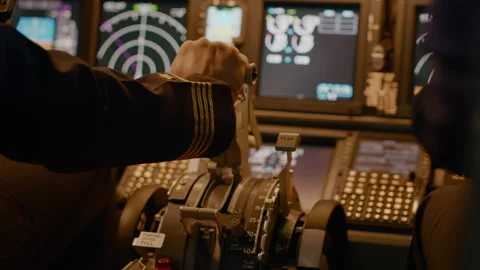 Aircraft captain in cockpit command taking off with airplane Stock Footage 202102454