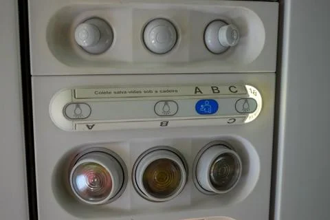 Aircraft ceiling cabin reading light and air-con blower Stock Photos