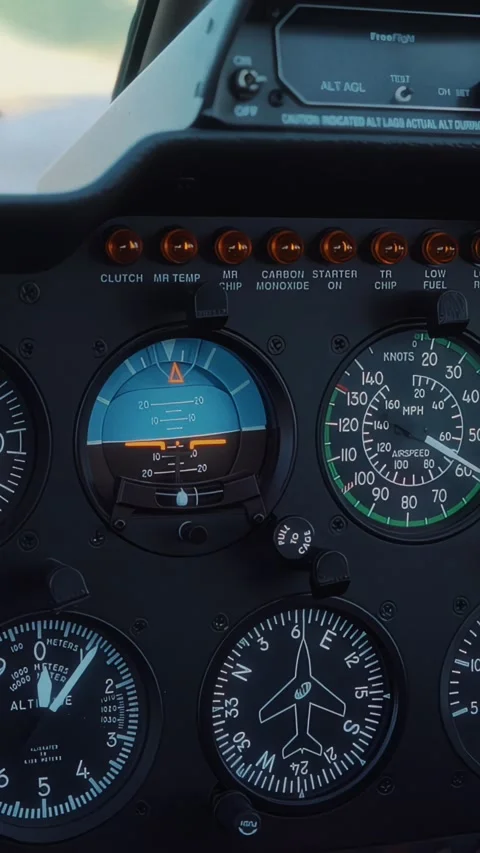 Aircraft cockpit instrument panel displaying altitude, airspeed, and engine Stock Footage 329201822