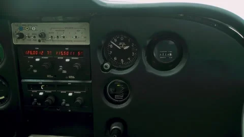 Aircraft cockpit instruments display changing readings on gauges and controls, Video stock 328481226