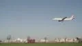 Aircraft coming in to land over a busy road HD Footage