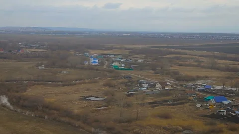 Aircraft dropping goes on landing. From the window Stock-Footage 89070862