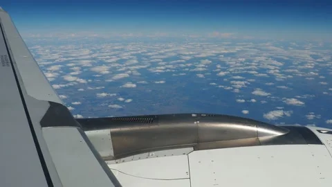 Aircraft engine and wing on the border of atmosphere and space. The edge of the Stockbeeldmateriaal 237714408