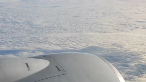 Aircraft engine closeup above the clouds Stock Footage 115113604