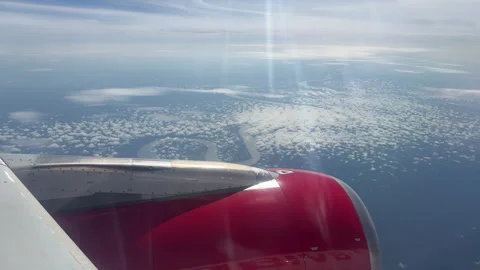 Aircraft Engine Overlooking Meandering River and Cloud Patterns Stock Footage 336218710