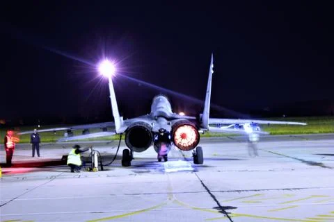 Аircraft engine starting at night Stock Photos