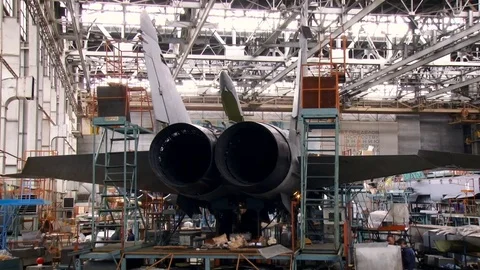 Aircraft Factory. Fighter Framework Staying in Department. Stairs on Platform. Stockbeeldmateriaal 71995361