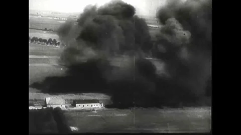 Aircraft fly near the ground after bomb drop Stock Footage