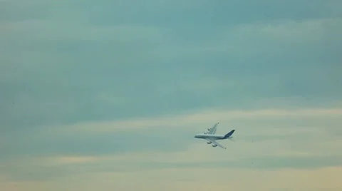 Aircraft fly in the sky and turn during air show Stock Footage