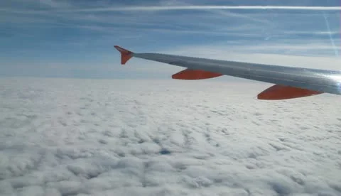 Aircraft flying in the clouds Stock Footage 10735513