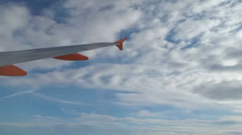 Aircraft flying in the clouds Stock Footage 10735603