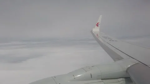 Aircraft flying over cloudy sky. Stock Footage 244502218