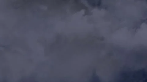 Aircraft flying in sky through dark thunderstorm clouds, pilot's point of view Stock Footage 57917962