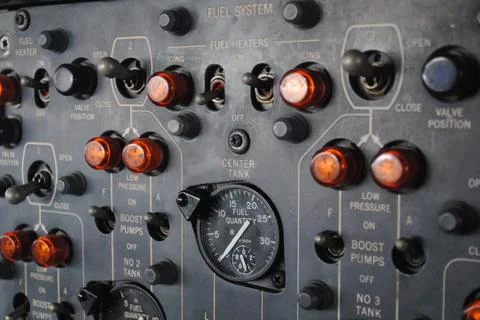 Aircraft Fuel System Control Panel with Switches, Gauges, and Illuminated I.. Stock Photos