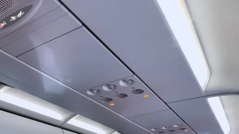 Aircraft interior bottom view, air conditioning light Stock Footage 115472296