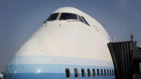 Aircraft - Jumbo Boeing 747 parking at g... | Stock Video | Pond5