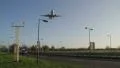 Aircraft landing over a busy road HD Footage