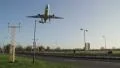 Aircraft landing over a busy road HD Footage