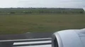 Aircraft landing, view of engine and runway from plane window, travel by air 4k or 4k+ Resolution
