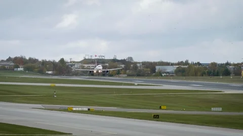 An aircraft lands on the runway Stock Footage 289130771