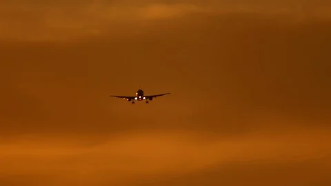 Aircraft in the light of sunset Video stock 94669776