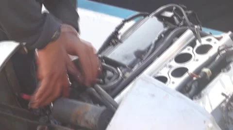 An aircraft mechanic works on an engine. Stock Footage 62519913