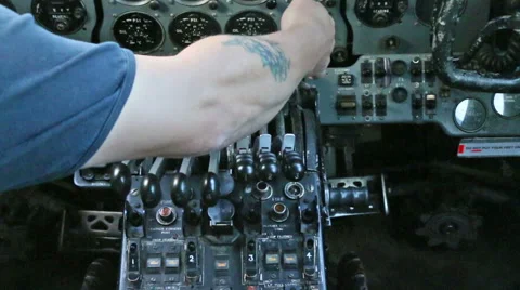 Aircraft panel hand flicks switch 11 Stock Footage 42911671