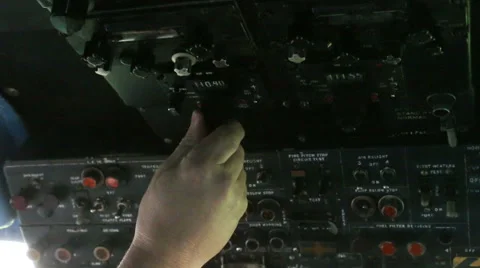 Aircraft panel hand flicks switch 14 Stock Footage 42911702