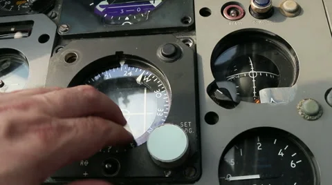 Aircraft panel hand taps compass 1 Stock Footage 42497023