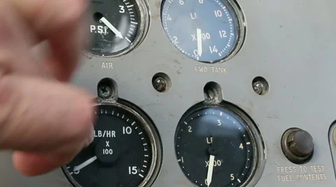 Aircraft panel hand taps dial 1 Stock Footage 42497084