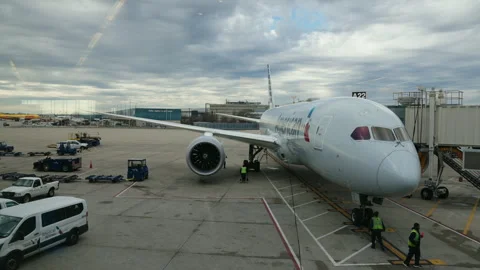 Aircraft parked at the gate terminal, slow motion 4k Stock Footage 334269510