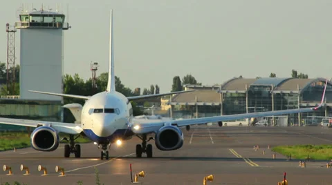 Aircraft with passengers steering, turning for take-off Stock Footage 27304390
