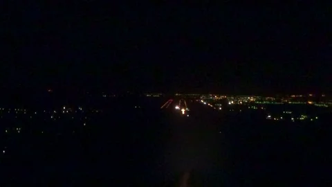 The aircraft performs a night landing Stock Footage 78693898