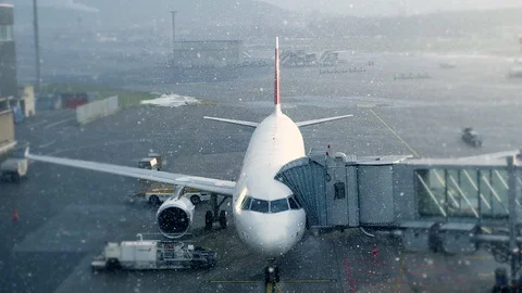 Aircraft Plane Preparing for Flight on a Cold Snowy Day Stock Footage 87710987