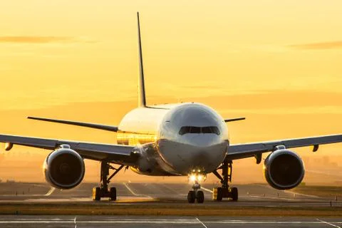 Aircraft at sunset Stock Photos
