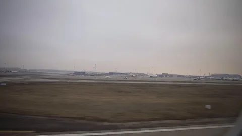 The aircraft take-off. View from inside the aircraft through the porthole Stock Footage 105899354