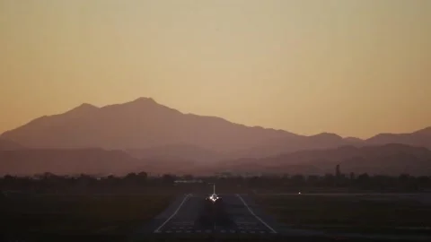 Aircraft taking off with another one approaching in the background Video stock 169702372