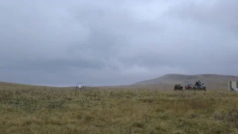 Aircraft taking a flight near a mountainous region Stock Footage 79786053