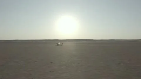 Aircraft taking off salt pan Video stock 147662512